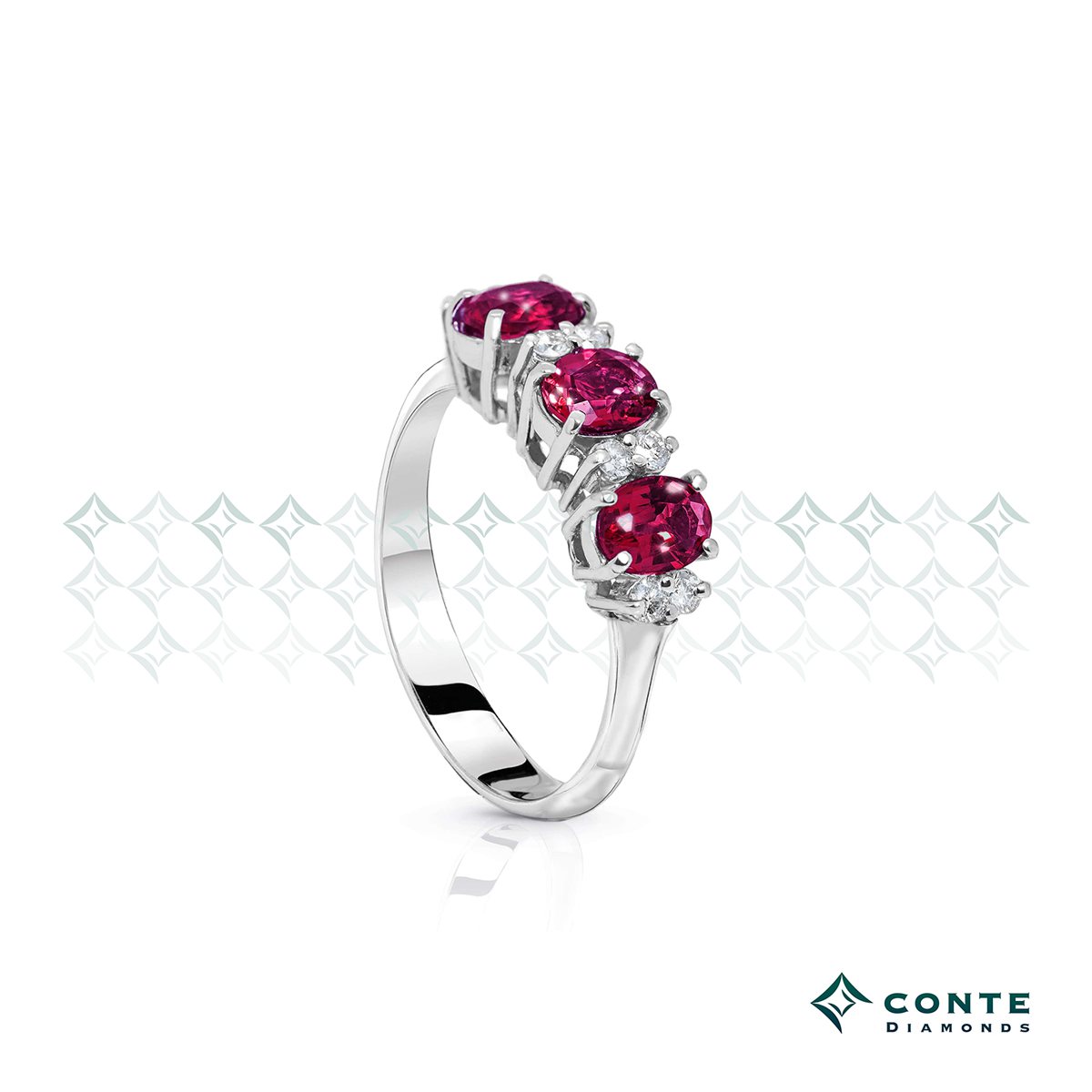 Anello trilogy con rubini