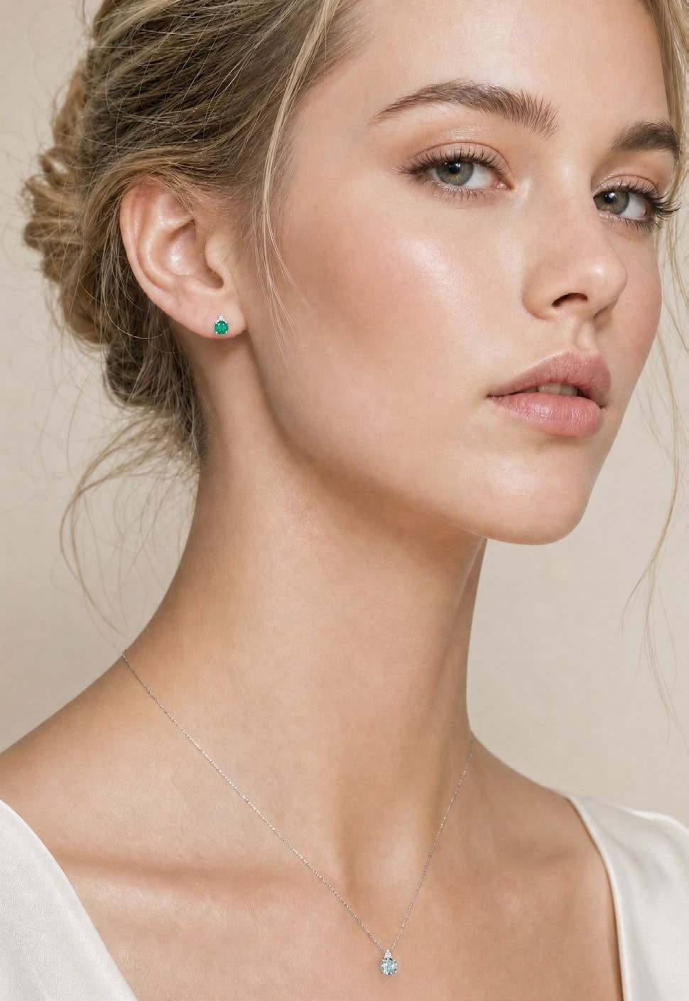 Collezione Easy Round di Conte Diamonds: anello, collana, orecchini con acquamarina, smeraldo, zaffiro